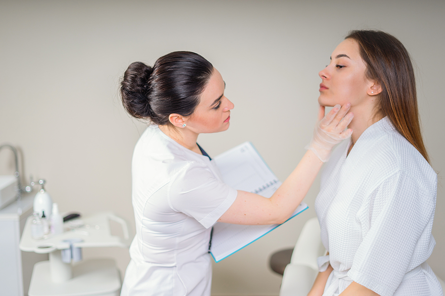 Woman getting her skin checked at a skin clinic in Melbourne